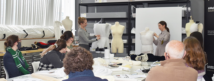 Textiles conservators presenting a workshop at Artlab